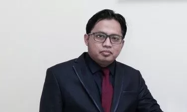 Ikhwan Ashadi, SE., Ak., MM., M.Ak., M.H., CA., CPA., BKP